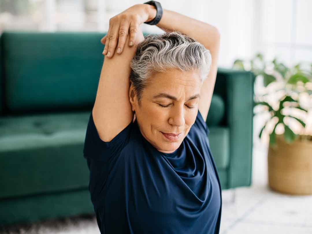 121 Physical Therapy Clarkston, Michigan Orthopedic Rehabilitation Woman Stretching Shoulder